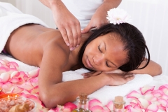 Woman Receiving Massage At Spa